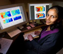 Oceanographer Amala Mahadevan with a model showing the role of eddies in the bloom.