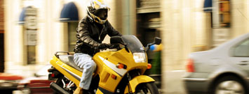 Photo: A person riding a motorcycle