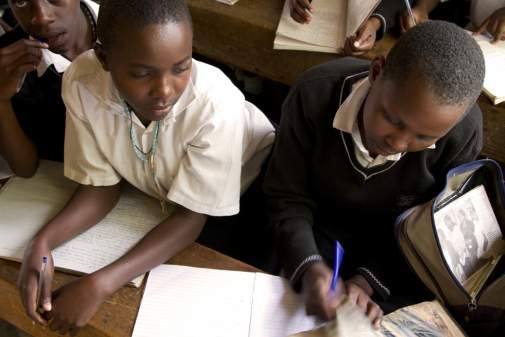 Ugandan girls reading during the UNITY program