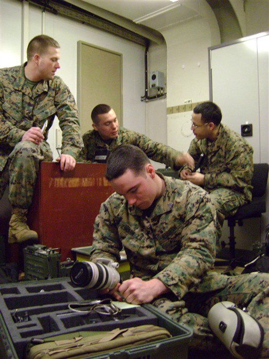 HER MAJESTY&#39;S SHIP OCEAN &mdash; Marines from Company E, 4th Reconnaissance Battalion, inventory and inspect communication equipment aboard the HMS Ocean Feb. 20 in preparation for a landing on the Norwegian coast later that day. The Marines are embarked on the HMS Ocean while participating in Cold Response 2010, a multinational military exercise focused on cold weather amphibious operations, interoperability of expeditionary forces, and special and conventional ground operations. (Photo by Marine Forces Europe)