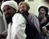 Pakistani men listen during meeting. (Photo: NY Times)