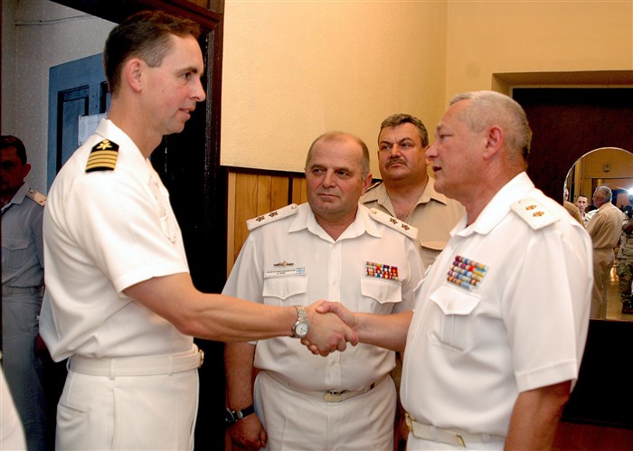 ODESSA, Ukraine &mdash; US Navy Commodore John Moore, Deputy Commander Sea Breeze 2008, exchange greetings with Vice Admiral Igor Tenyukh, Commander Naval Forces, Ukraine and Vice Admiral Viktor Maximov, First Deputy Commander of Ukrainian Naval Forces during opening ceremonies of exercise Sea Breeze 2008, an invitational joint and combined maritime exercise with the goals of enhancing multinational interoperability, developing Black Sea-nation maritime security capabilities, and improving involvement in the larger Black Sea Theater Security Cooperation (TSC) strategy.  (Department of Defense photos by Navy Mass Communications Specialist First Class Anthony Dallas)
