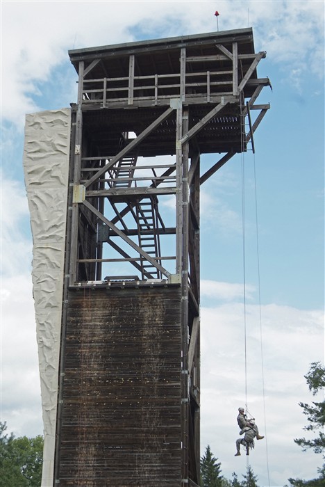 BOBLINGEN, Germany &mdash; Two soldiers from C Company 2nd Battalion, 10 Special Forces Group, train on mountaineering techniques on the Repel tower at the 7 Army Training Command&#39;s Range Complex here July 21, 2008. (Department of Defense photo by Martin Greeson)