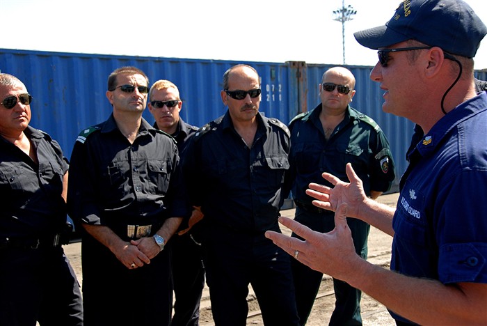 BURGAS, Bulgaria &mdash; Petty Officer 1st Class Troy Matthews of the U.S. Coast Guard Cutter Dallas (WHEC 716) describes U.S. Coast Guard vessel boarding and inspection procedures to a group of Bulgarian Border Policemen here, Sept. 7, 2008.  Dallas arrived in Bulgaria Sept. 6, and is training with the Bulgarian Border Police to improve maritime safety and security. (Department of Defense photo by U.S. Coast Guard  Petty Officer 2nd Class Lauren Jorgensen)