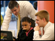 Through Horton's Kids, a nonprofit organization that serves more than 200 children living in Anacostia, Department employees, shown here with the Secretary, tutor students from some of of D.C.'s neediest schools every week for an hour.