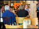 Secretary Duncan stops at Muddy Waters cafe in Burlington, Vt., to talk with teachers on his listening tour about education reform.