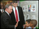 New York City Schools Chancellor Joel Klein, New York City Mayor Michael Bloomberg and U.S. Secretary of Education Arne Duncan visit with students at Explore Charter School.  Secretary Duncan visited Explore Charter School in Brooklyn, N.Y., to discuss the importance of the American Recovery and Reinvestment Act of 2009, which provides $100 billion for education funding to save and create jobs, advance school reform and provide college grants, tuition tax credits, and school modernization funds.
