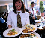 waitress with plates of food