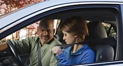 Photo: Father and daughter in a car