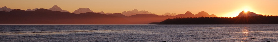 Sunset view of Glacier Bay and the surrounding Fairweather Mountains.
