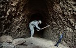 U.S. Troops Search Cave for Weapons 