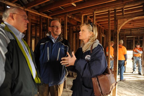 Minot, ND, October 13, 2011 -- FEMA Region VIII Administrator Robin Finegan and David Myers (center), Director of the DHS Center for Faith-based and Neighborhood Partnerships, visit with National Voluntary Organizations Active in Disaster President Mickey Caison (left)