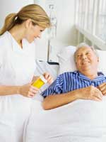 Photo: A heathcare professional wit ha patient