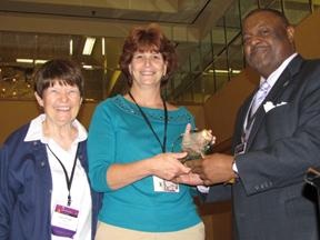 Picutre of Tammy McKenna, center, received the Carol Pozsik Nursing award.