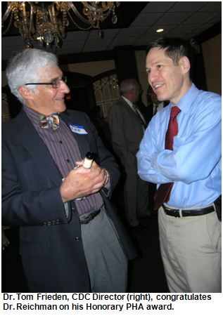 Dr. Tom Frieden, CDC Director (right), congratulates Dr. Reichman on his Honorary PHA award.