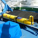 Yellow ocean glider on boat