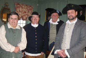 group dressed in 18th century garb