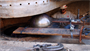 The moment of truth as the custom-made pintal ball is moved into place under the dam gate. There were no existing replacement parts available for this work at Chouteau Lock and Dam 17 in Chouteau, Okla., so crews were forced to wait until the actual placement of the part to know if it would fit, which it did.