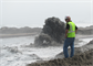 SOUTH PADRE ISLAND, Texas (2010) - Brownsville Resident Engineer Kenneth (Chip) Worley, monitors the placement of dredged material on the beach of South Padre Island. Beach renourishment, also called beneficial use,
employs environmentally and economically responsible ways to utilize dredged materials to benefit local communities, including improving eroded coastlines.