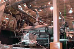 Fig. 3. Enclosed and exhaust ventilated tumbler and duct work