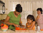 Food Safety - thumbnail of woman cutting vegetables in kitchen