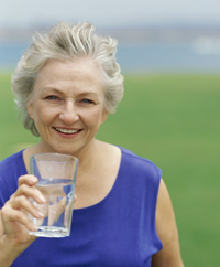 Photo: Older Lady Drinking Water from Glass