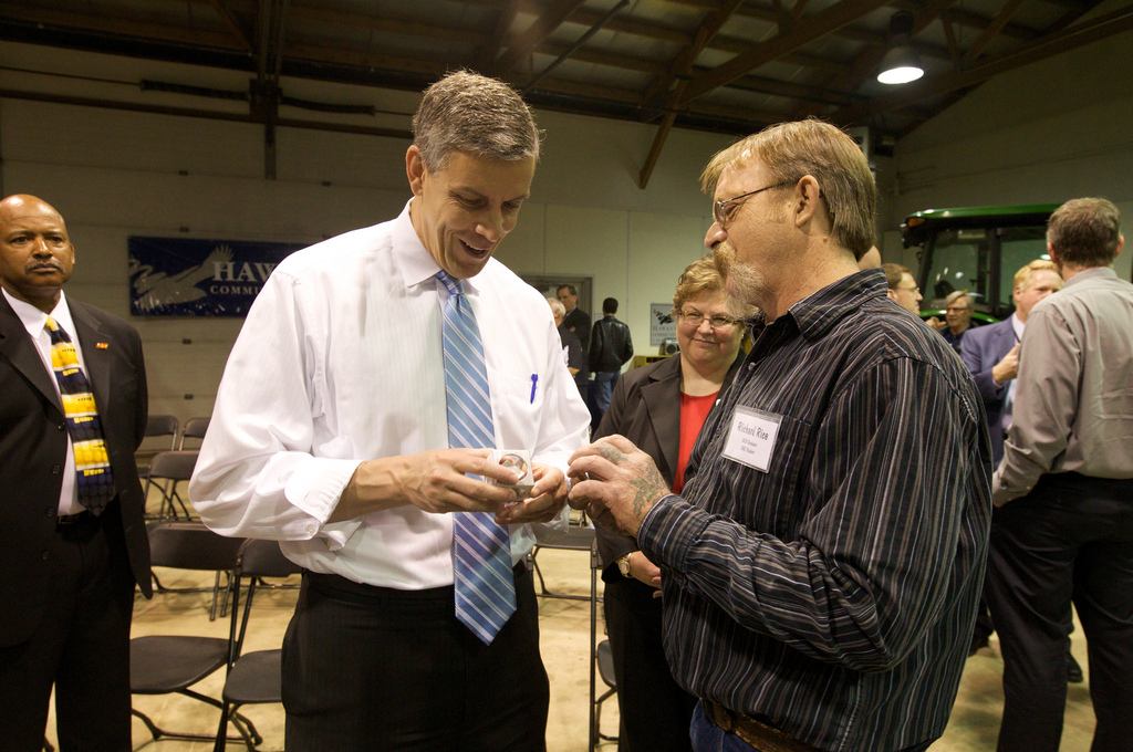 Richard Rice, a Hawkeye Community College student, shows Secretary Duncan a sculpture he designed in class. Official Department of Education photo by Paul Wood.