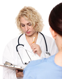 Patient with a doctor holding a chart