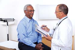 A male patient talking with his doctor