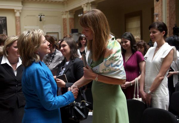 Secretary Clinton is greeted by the First Lady of Georgia, Sandra Roelofs, at the Town Hall meeting for Georgian Women Leaders.

