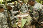 Sixty-five service members participating in the Keris Strike 2012 exercise went into...