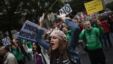 Protesters shout slogans during a demonstration against cuts in public education, in central Madrid, September 27, 2012.