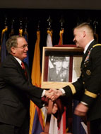 Lt. Gen. David Perkins congratulates retired Gen. Charles Krulack for becoming the first Marine to be inducted into the Fort Leavenworth Hall of Fame.