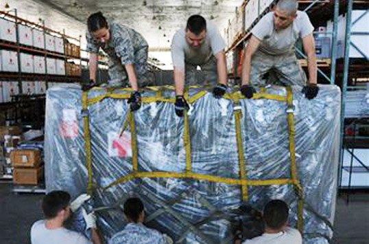 Photo: Airmen packing a pallet