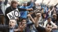 Protesters shout slogans during a demonstration outside Madrid's Parliament, September 26, 2012. 