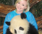 Jessica Beinecke, the host of VOA’s popular English learning blog OMG! Meiyu, posing with a panda in Chana.