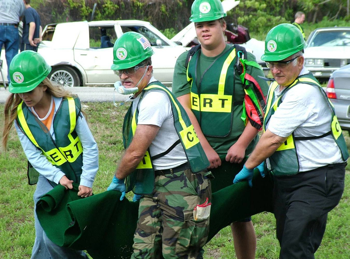 CERT volunteers carrying an injured victim