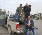 Cameraman Cuneyt Unal, with camera, in an undated picture with colleagues.