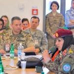 Afghan National Army Brig. Gen. Khatool Mohammadzai introduces herself to the attendees of the Female Shura. (U.S. Navy Photo by Petty Officer 1st Class Christophe Laurent)