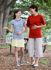 mother and daughter walking in the park