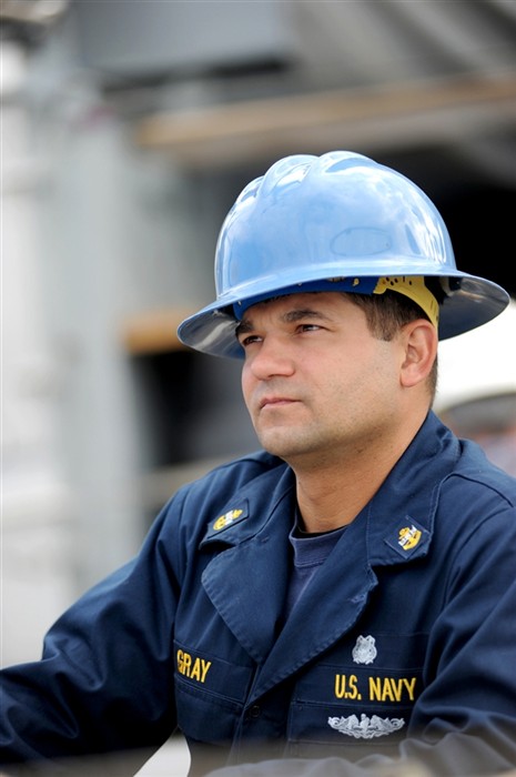 NORTH SEA (July 19, 2011) Chief Navy Diver Jason Gray attached with Mobile Diving and Salvage Unit (MDSU) 2, helps oversee dive station preparations aboard the Military Sealift Command rescue and salvage ship USNS Grasp (T-ARS 51). Grasp, MDSU-2 and Navy archeologist, scientist, and historians are currently deployed to the North Sea to conduct diving expeditions. (U.S. Navy Photo by Mass Communication Specialist 1st Class Ja&#39;lon A. Rhinehart/UNRELEASED)