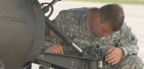 Soldier working on Helicoper landing gear