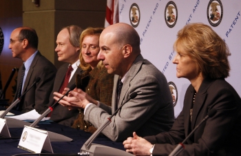 USPTO Director Kappos engages with an audience member at an American Invents Act roadshow