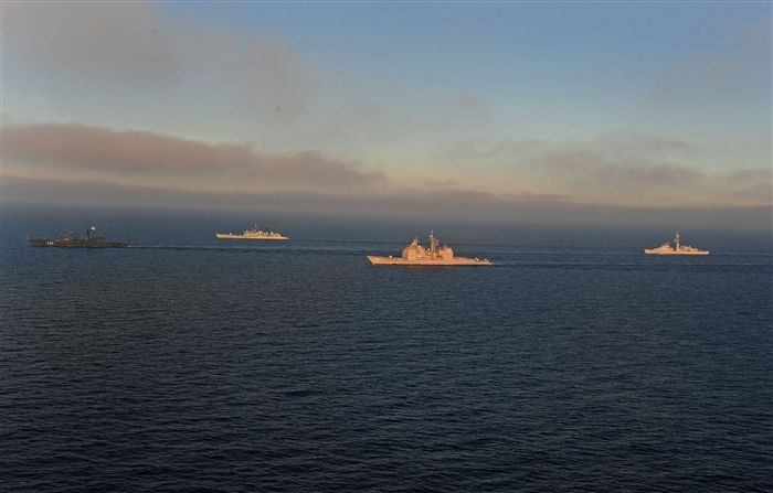 BALTIC SEA - Russian naval vessel Yaroslav Mudriy (727), left, British naval vessel HMS York (90), second from left, the guided-missile cruiser USS Normandy (CG 60), third from left, and French naval vessel De Grasse (D612), right, sail in formation during the multinational training exercise FRUKUS 2012. FRUKUS is an annual exercise aimed at improving maritime security through an open dialogue and increased training between the navies of France, Russia, United Kingdom and United States. 