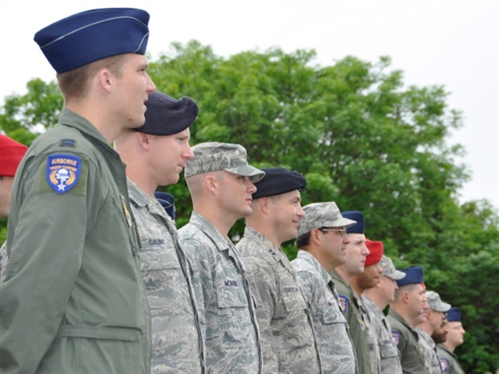 Airmen from the 86th Airlift Wing stand in formation June 1, 2012, before a commemorative ceremony in Picauville, France honoring the Airmen and soldiers who lost their lives during the famous Normandy D-Day invasion. U.S. and French forces attended the ceremony in the Picauville town square that remembers the transport aircrews and paratroopers who were killed when their C-47 aircraft was brought down by German anti-aircraft artillery during the early morning hours of June 6, 1944 during the invasion of France. The 86th Airlift Wing is based at Ramstein Air Base, Germany.