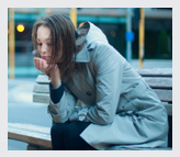 Homeless girl on a bench