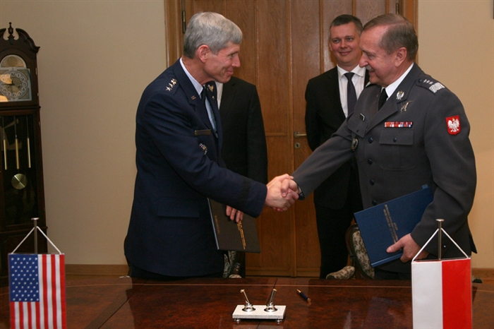 Air Force Chief of Staff Gen. Norton Schwartz and Polish Air Force Commander Lt. Gen. Lech Majewski sign the Military Personnel Exchange Program Memorandum of Understanding May 30, 2012 at a ceremony witnessed by U.S. Embassy Chargé d’affaires William Heidt and Defense Minister Tomasz Siemoniak. The MOU is the first of its kind in Central Europe and a significant step for both Air Forces. Through MPEP, the U.S. and Polish Air Forces exchange military officers in each other's Services. Along with family members, several Air Force Captains will work and live alongside their Allies. MPEP promotes mutual understanding and trust, enhances interoperability, strengthens air force-to-air force ties, and develops long-term professional and personal relationships. The Air Force officers and their families are expected to be in-place by the end of 2013 at Powidz and Krzesiny Air Bases in Poland, and at Luke and Pope Air Force Bases in Arizona and North Carolina.