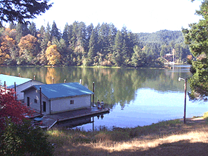 View of Dock, Boat Houses, and Lake 