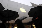 Customers enter the Apple flagship retail store to purchase the new iPad in San Francisco, California in this March 16, 2012 file photograph. Shares in top Asian suppliers to Apple Inc took a hit on July 25, 2012 after the company's latest quarterly results missed expectations, although several recovered ground as investors looked ahead to the company's new products later this year. REUTERS/Robert Galbraith/Files (UNITED STATES - Tags: BUSINESS SCIENCE TECHNOLOGY)