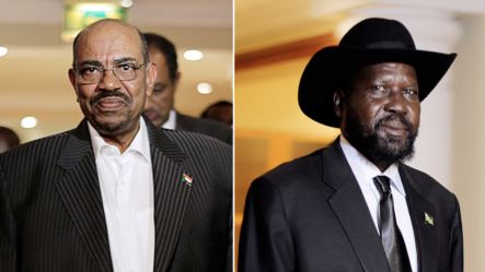 Sudan's President Omar al-Bashir (L) and  his South Sudanese counterpart Salva Kiir walking in a hotel in Addis Ababa on September 24, 2012